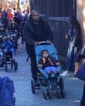Kanye West at DIsneyland with daughter North