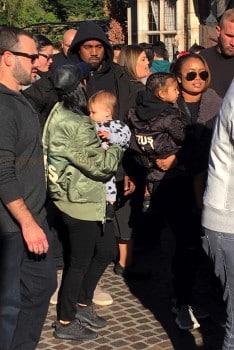 Kourtney Kardashian at Disneyland with son Reign Disick and BIL Kanye West