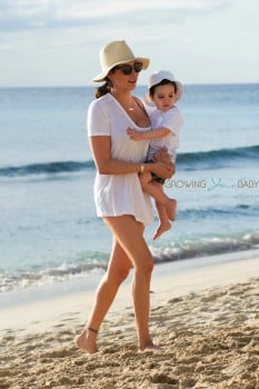 Lauren Silverman with son Eric Cowell on the beach in Barbados