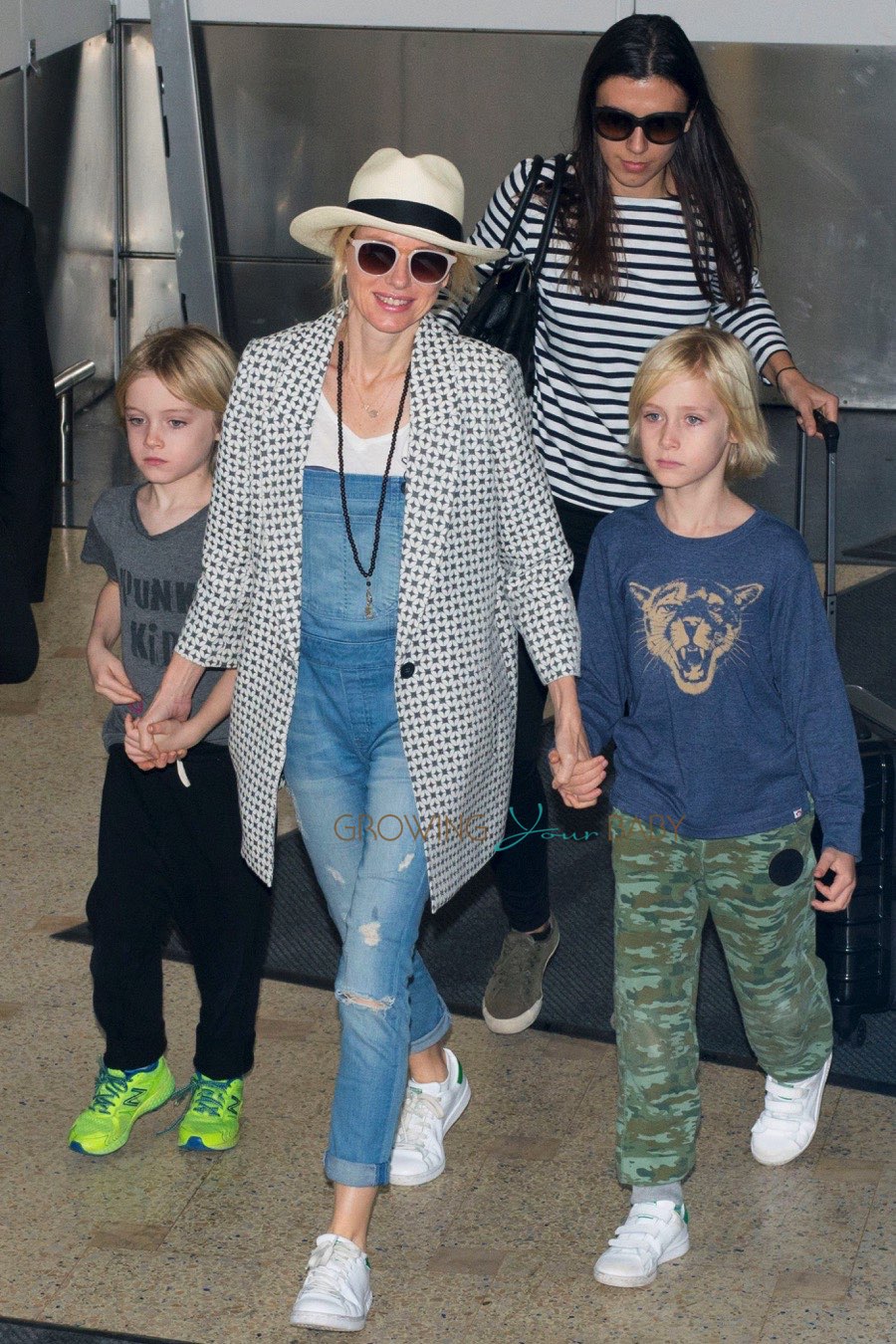 Naomi Watts arrives in Australia with sons Samuel and Alexander for the holidays