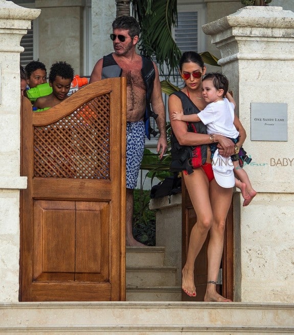 Simon Cowell and Lauren Silverman with son Eric Cowell on the beach in Barbados