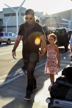 Gabriel Aubry takes a flight out of Los Angeles with adorable Nahla