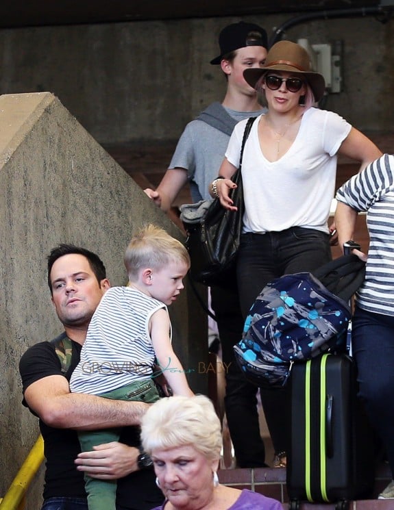 Hilary Duff and her ex-husband Mike Comrie are spotted at the airport in Maui with their son Luca Comrie on February 04, 2016