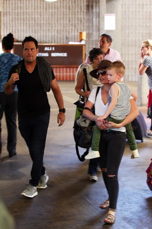 Hilary Duff and her ex-husband Mike Comrie are spotted at the airport in Maui with their son Luca Comrie on February 04, 2016