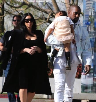 Kim and Kanye shop with a sleepy North West in Beverly Hills
