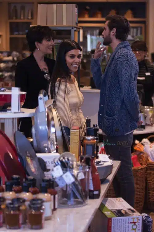 Kourtney Kardashian, Kris Jenner and Scott Disick hug at Williams Sonoma