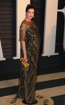 Pregnant Anne Hathaway on the red carpet at the Vanity Fair Party 2016