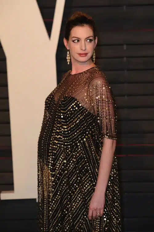Pregnant Anne Hathaway on the red carpet at the Vanity Fair Party 2016