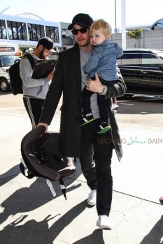 Pregnant Ginnifer Goodwin and Josh Dallas depart LAX with their Son Oliver