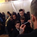 Victoria Beckham is surrounded by her children at her fashion show