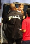 Kanye West Carries his daughter North West as they head in to the mall