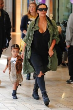 Kim Kardashian walks with her daughter North West in LA