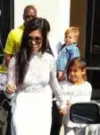 Kourtney Kardashian and Mason Disick attend Easter Sunday with mom Kris Jenner and son Reign