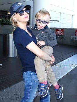 Anna Faris & Son Jack Arriving On A Flight At LAX