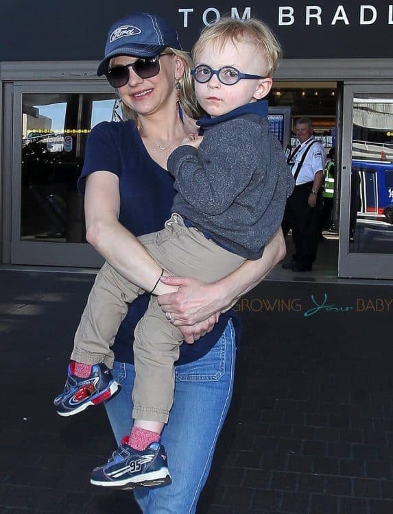 Anna Faris & Son Jack Arriving On A Flight At LAX