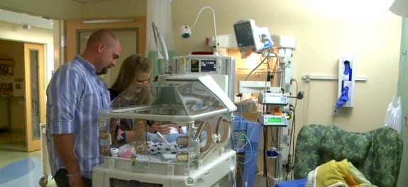 Kristen and Ian Miller with their twin Micah