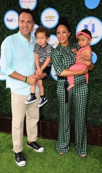 Tamera Mowry with husband Adam Housely and kids Aden and Ariah at the Safe Kids Event