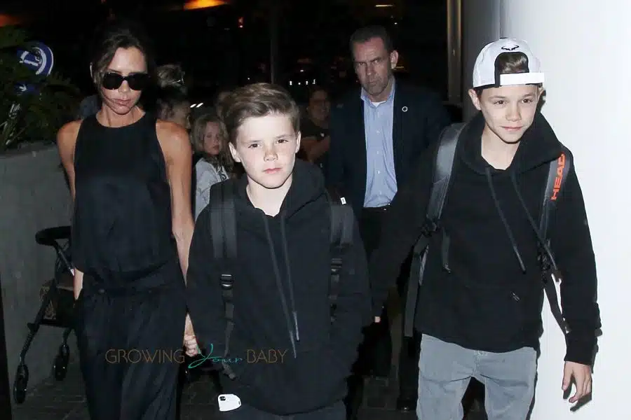 Victoria Beckham at LAX airport with kids Harper, Cruz and Romeo