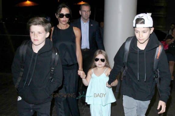 Victoria Beckham at the airport with kids Harper, Cruz and Romeo