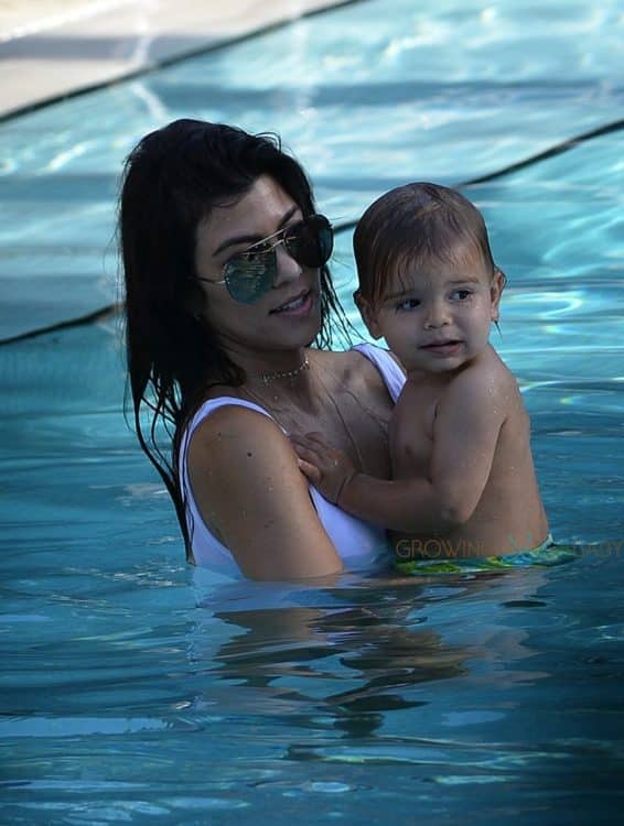 KOurtney Kardashian at the pool in Miami with son Reign Disick