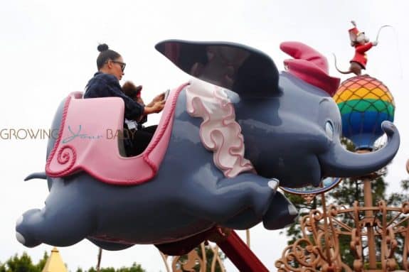 Kim Kardashian rides Dumbo with daughter North West