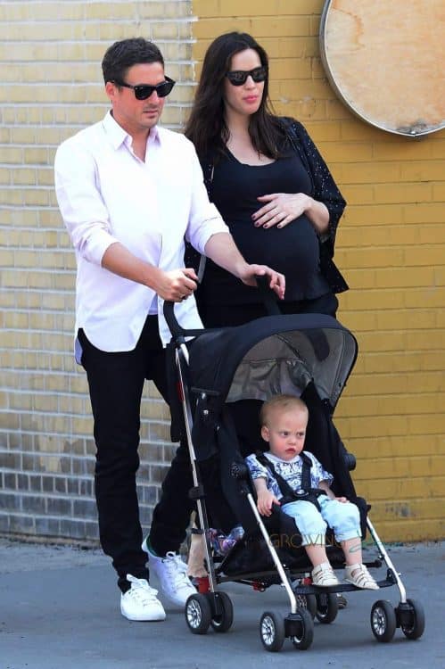 A very pregnant Liv Tyler out in NYC with partner Dave Gardner and son Sailor