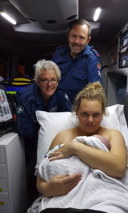 Amy Gibson and baby Sophie in an ambulance