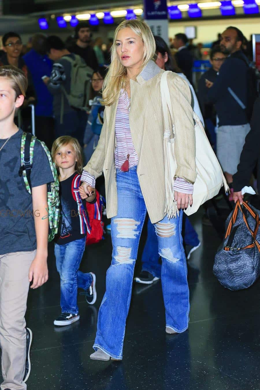 Kate hudson arrives in NYC with sons Ryder and Bing