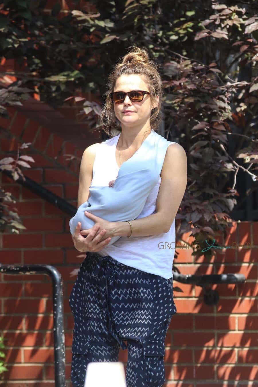 Keri Russell wears her baby boy in Brooklyn