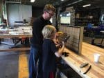 Lars and his dad building the cabinets