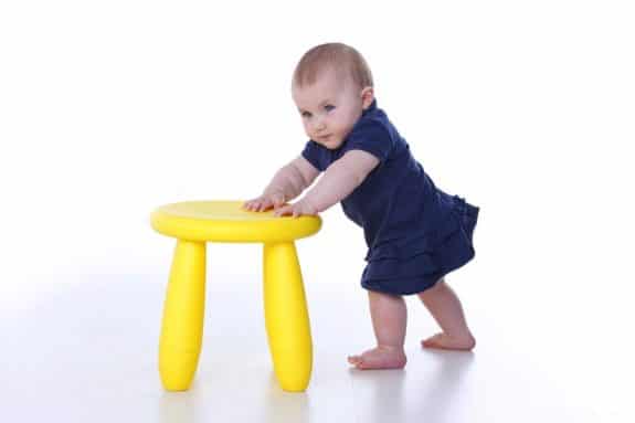 help baby stand up