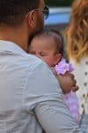 John Legend carries his baby girl Luna in Saint Tropez