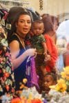 Kim Kardashian with kids North and Saint at grandmother's store opening San Diego