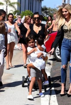 Kim and Khloe Kardashian with Mason and North in San Diego