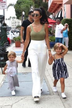 Kourtney Kardashian with kids Penelope and Reign at grandmother's store opening in San Diego