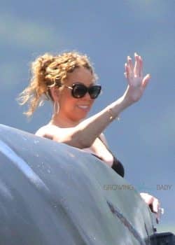 Mariah Carey waves to her kids as they jetski in Capri, Italy