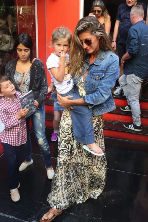 Gisele Bundchen leaves a restaurant at the Jardim Botanical Gardens with her kids Vivian and Benjamin