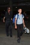 Victoria Beckham arrives at LAX with son Romeo