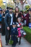 Alessandra Ambrosio and Jamie Mazur posed for photos with their kids Anja and Noah as they collected some treats In Santa Monica.