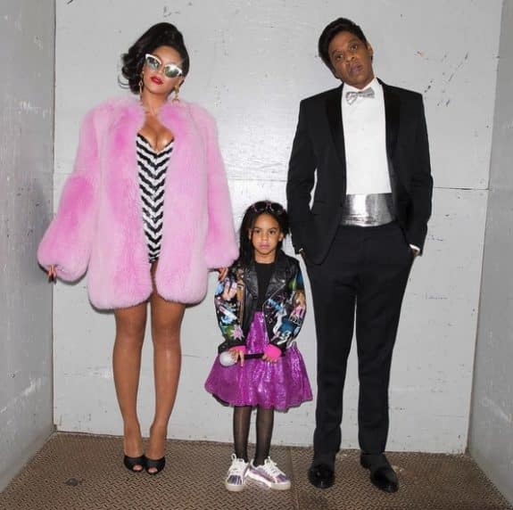 Jay-Z and Beyonce dress as ken and barbie with daughter Blue Ivy