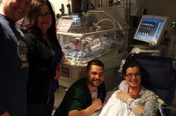 Lucas and Katie Schaftlein celebrate the Nov. 11 arrival of quintuplets with family.