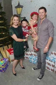 beverly-mitchell-and-michael-cameron-with-kids-hutton-and-kenzie-at-the-6th-annual-santas-secret-workshop