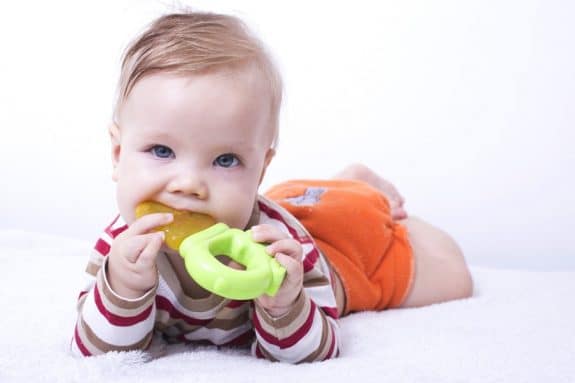 Infant with the teether