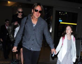 Keith Urban & daughter Sunday Rose Touch Down At LAX