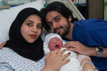 Moaza al Matrooshi with her husband, Ahmed, and their newborn baby, Rashid