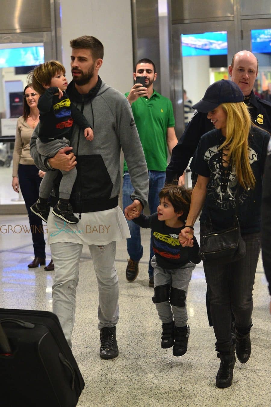 Shakira and Gerard Pique arrive to Miami airport with their kids