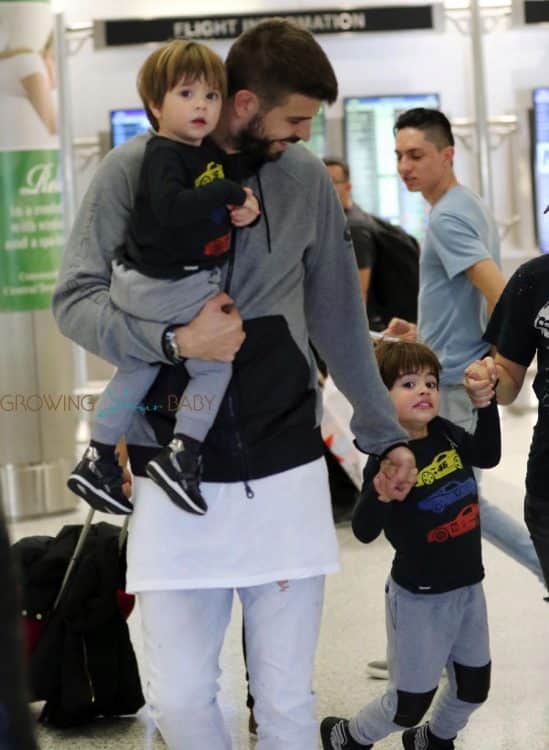 Shakira and Gerard Pique arrive to Miami airport with their kids