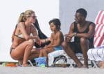 Doutzen Kroes, Sunnery James and Phyllon Gorre at the beach in Miami