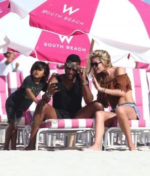 Doutzen Kroes, Sunnery James and Phyllon Gorre at the beach in Miami