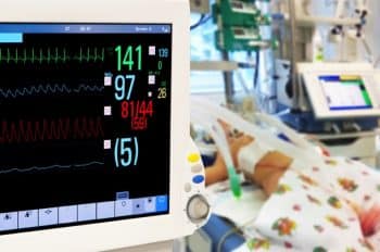 Baby in NICU with monitors